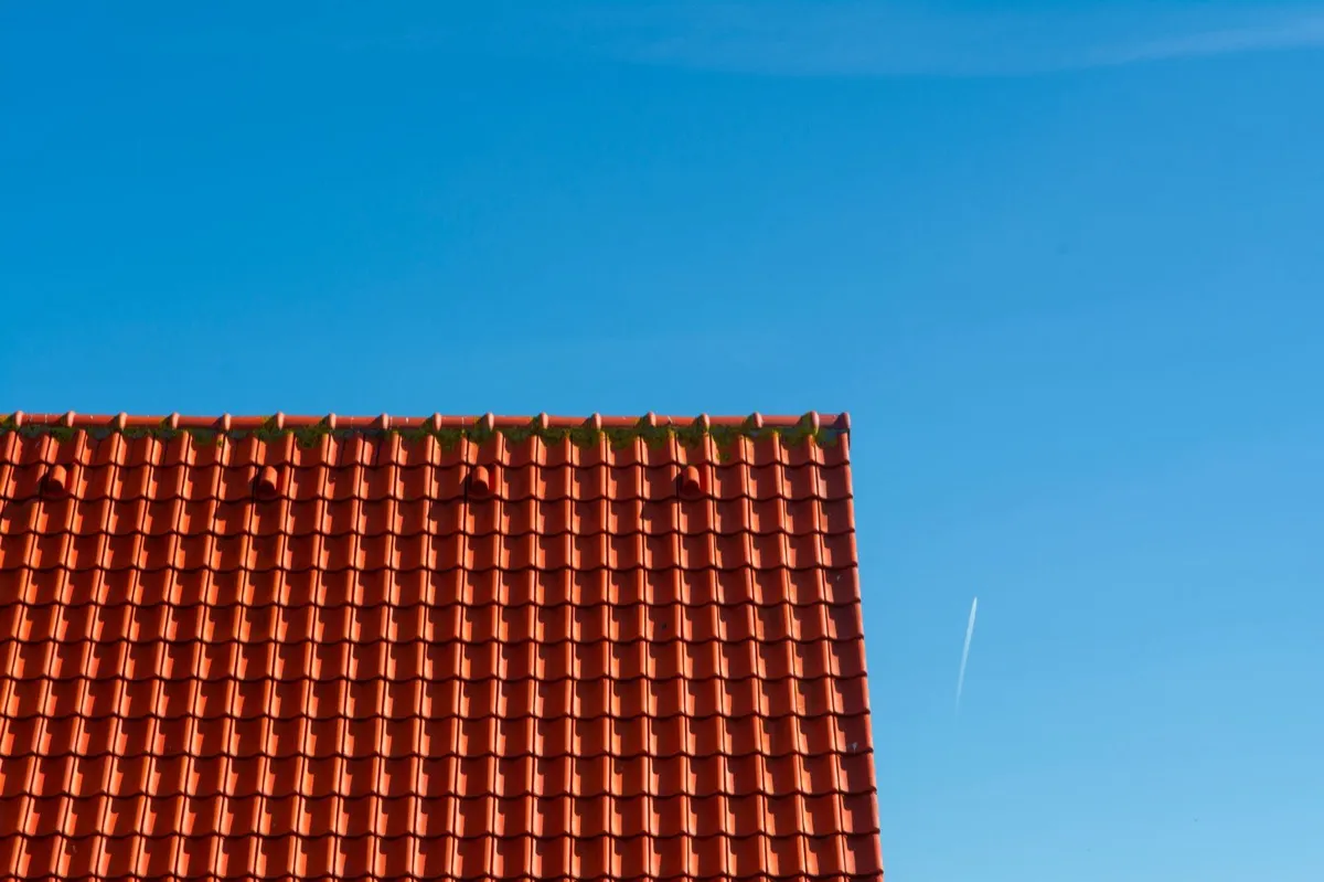 Tile roof gable in full sun, the kind of exposure that sets roof life in Canton, OH